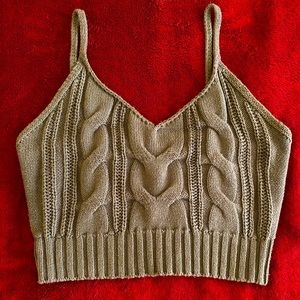 Cute stitched styled green top in the size small & has only been wore twice.